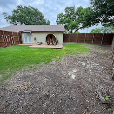 Full-Backyard-Artificial-Turf-Installation-with-Landscape-Rock-Border-in-Garland-TX 1